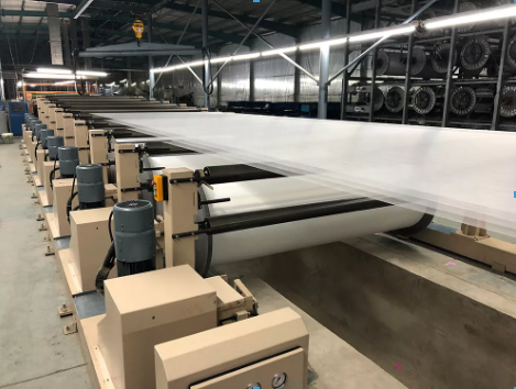 mesin warp rebeaming 